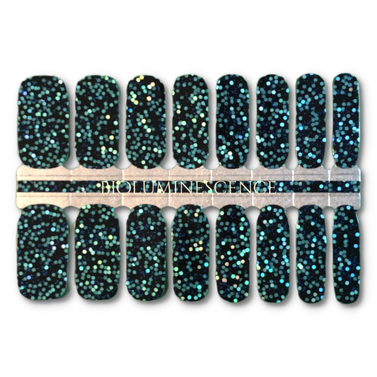 16 Real nail polish strips also called nail wraps or nail stickers. black base with chunky holographic glitter and tiny blue glitter.